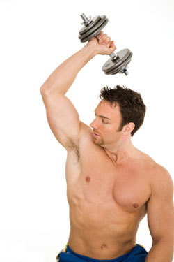 man doing tricep extensions with dumbbell