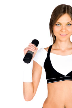 brown-haired woman doing curl with dumbbell